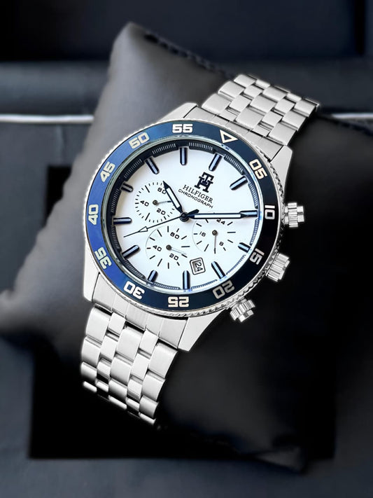 Tommy Hilfiger is a bold chronograph timepiece that perfectly blends sporty aesthetics with refined elegance, making it ideal for both everyday wear and special occasions. ⌚