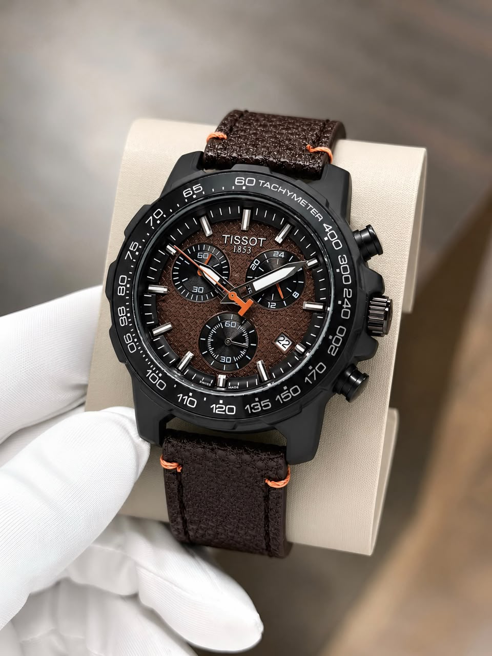 TISSOT. A timepiece built for performance, Inspired by the intensity of the court, this Supersport Chrono Basketball Edition combines Swiss precision with athletic energy. ⌚